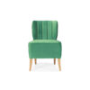 Green velvet chair with wooden legs.