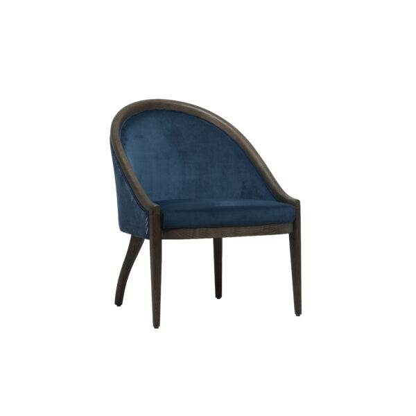 Blue velvet armchair with wood frame.